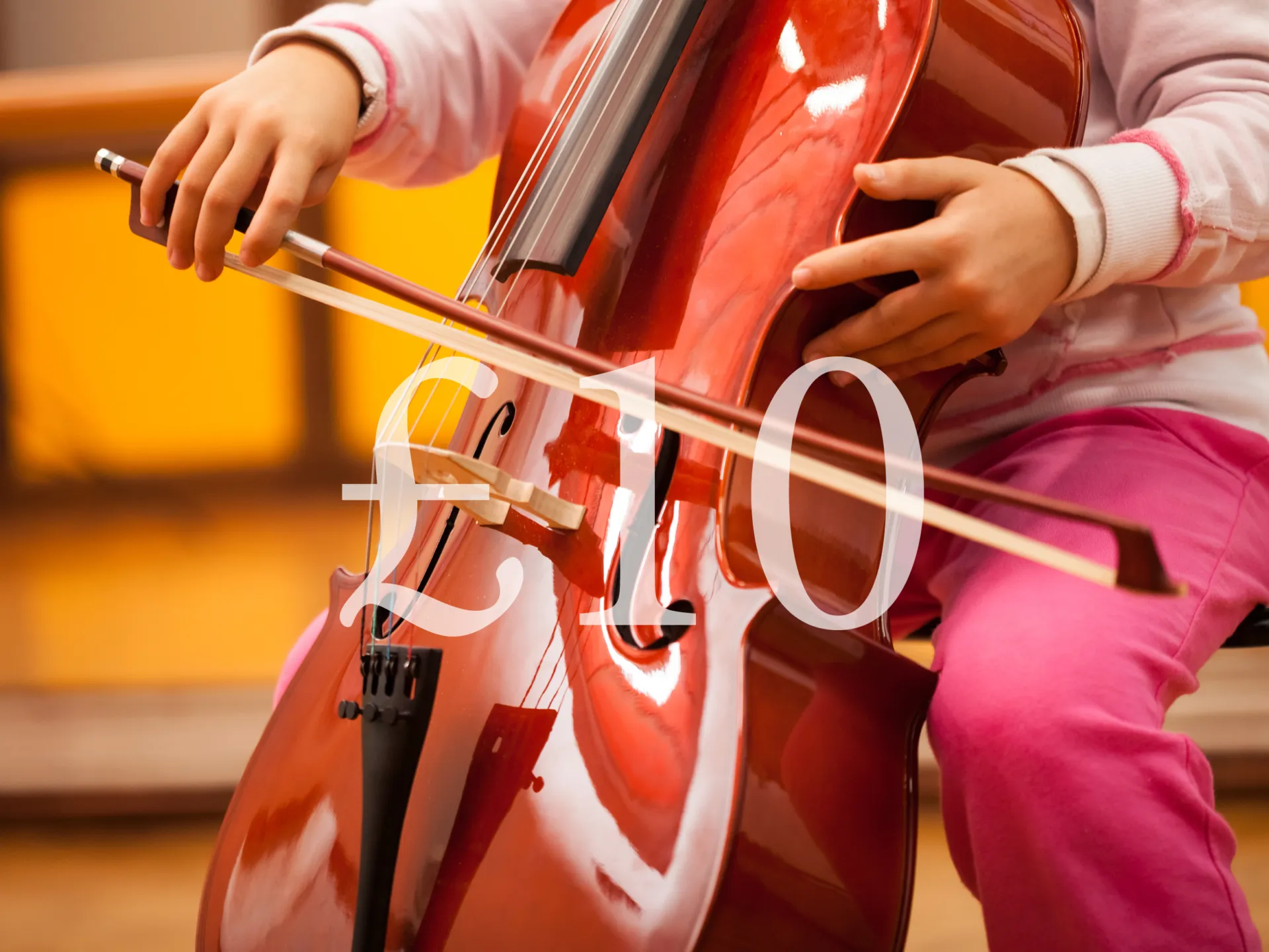 A person plays the cello