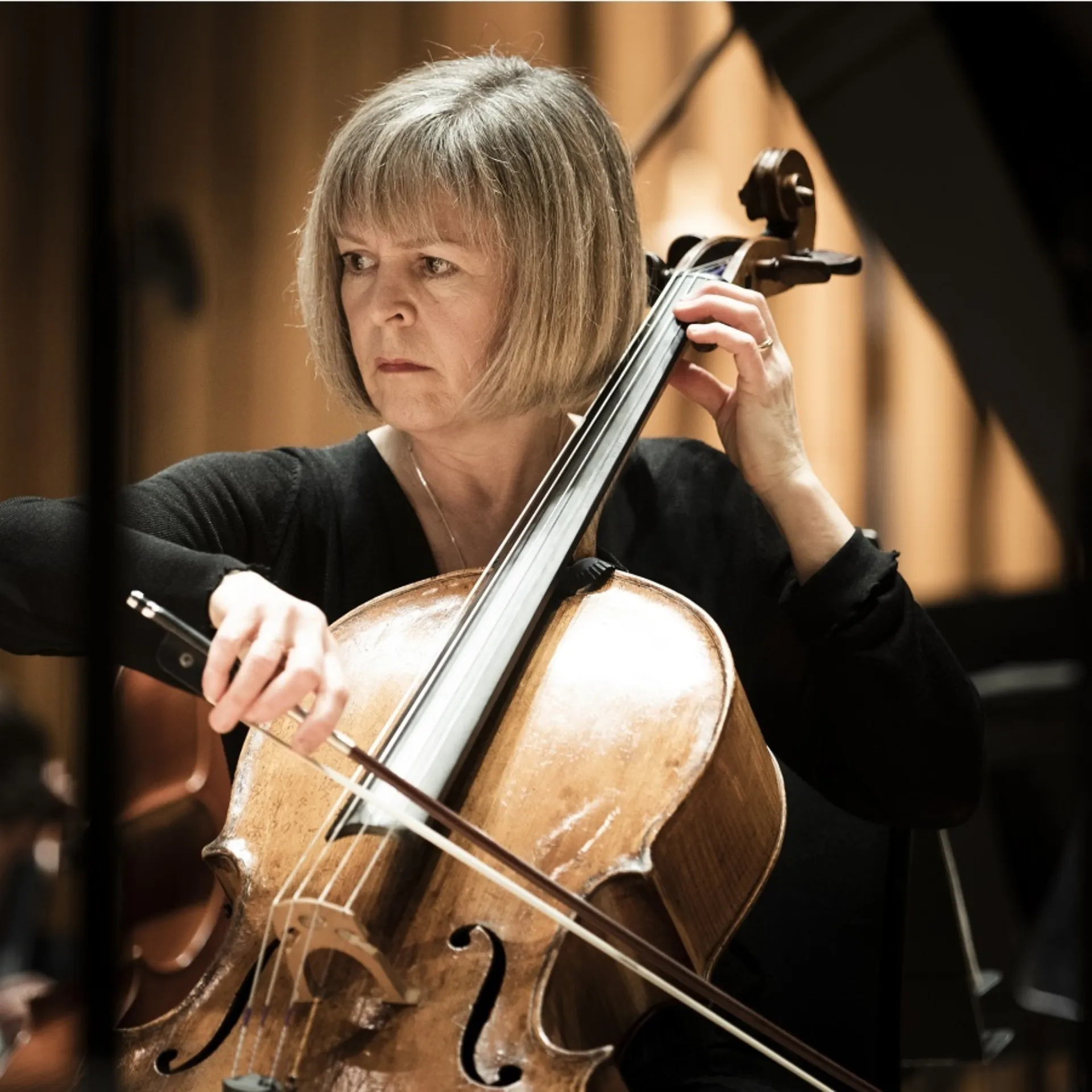 A woman playing the cello