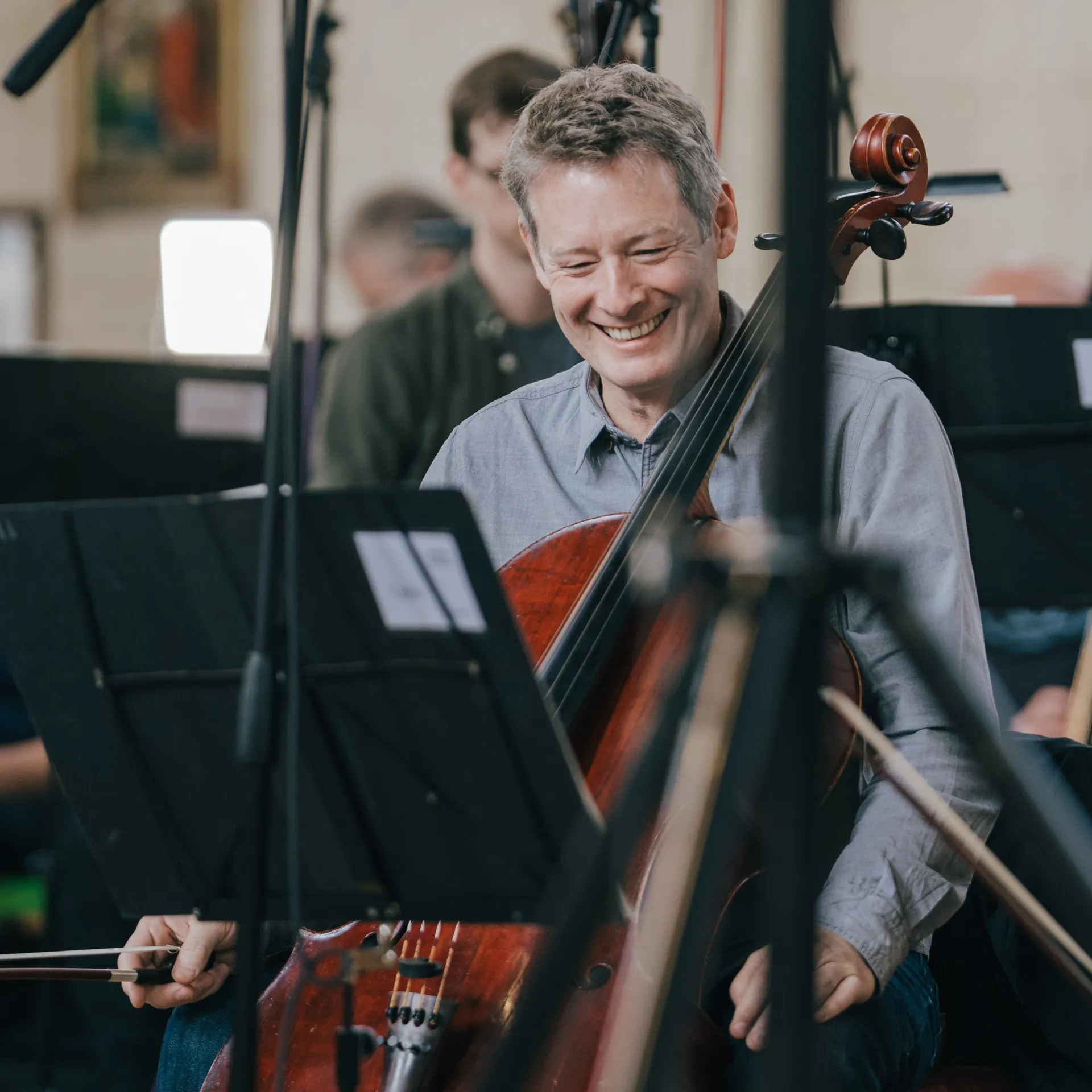 A man playing the cello